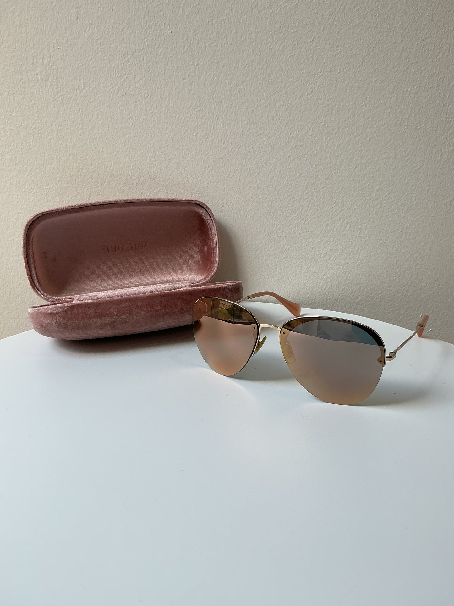 MIU MIU Rimless Aviator Sunglasses – Rose Gold